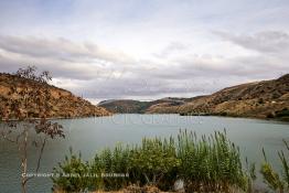 Image du Maroc Professionnelle de  Le Barrage Allal Al Fassi est situé dans la Province de Sefrou sur Oued Sebou avec un volume de stockage de 63.7 Mm3, il contrôle un bassin versant de 5.400 km2. Ce Barrage a été mis en service en 1990. But de l'ouvrage  production d'électricité, irrigation et protection contre les crues, Jeudi 8 septembre 2005. (Photo / Abdeljalil Bounhar) 